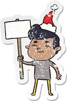 happy distressed sticker cartoon of a man with sign wearing santa hat vector