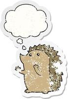 cartoon hedgehog and thought bubble as a distressed worn sticker vector