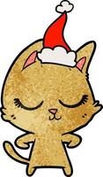 calm textured cartoon of a cat wearing santa hat vector