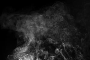 Abstract white smoke animated on a black background photo