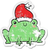 pegatina angustiada de una linda rana navideña de dibujos animados vector