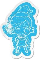 cartoon distressed sticker of a woman wearing santa hat vector