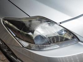 Varnish coating is peeling from the headlight. photo