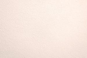 Seamless texture of white warming cement wall a rough surface, with space for text, for a background. photo