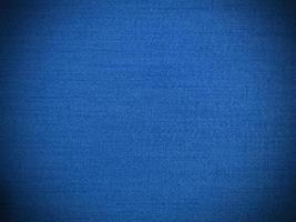 Blue velvet fabric texture used as background. Empty blue fabric background of soft and smooth textile material. There is space for text. photo