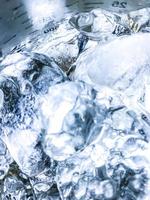 Abstract Ice background, Ice cubes feel fresh on hot days, Ice is indispensable in summer. It will help refresh and make you feel good. photo