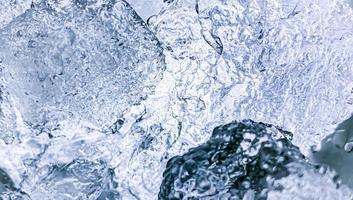 Abstract Ice background, Ice cubes feel fresh on hot days, Ice is indispensable in summer. It will help refresh and make you feel good. photo