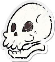 distressed sticker of a cartoon skull vector