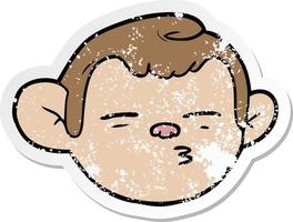distressed sticker of a cartoon monkey face vector