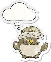 cute cartoon owl in hat and thought bubble as a distressed worn sticker vector