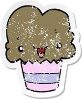 distressed sticker of a cartoon cupcake with face vector