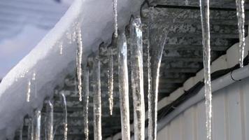 Close up of icicles on railing video