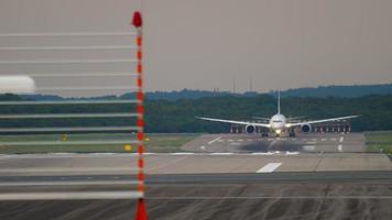 Widebody airplane accelerate and departure. Dusseldorf airport video