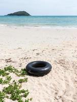 Large swim tube near the lonely beach. photo