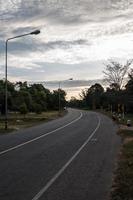 The silhouette of the local asphalt road. photo