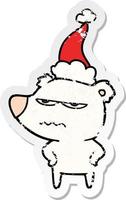 angry bear polar distressed sticker cartoon of a wearing santa hat vector