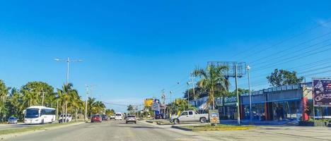 Cancun Quintana Roo Mexico 2022 Typical street road cars buildings and cityscape of Cancun Mexico. photo