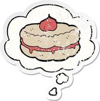 cartoon biscuit and thought bubble as a distressed worn sticker vector