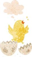 cartoon bird hatching from egg and thought bubble in retro textured style vector