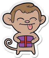 sticker of a funny cartoon monkey with christmas present vector