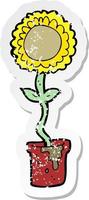 retro distressed sticker of a cartoon flower vector