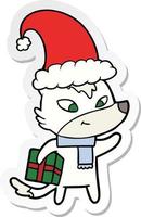 sticker of a friendly cartoon christmas wolf vector