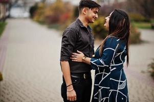 Love story of indian couple posed outdoor. photo