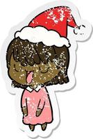 distressed sticker cartoon of a woman wearing santa hat vector