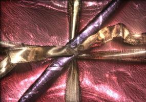 3D-Illustration of kirlian glow on beautifully wrapped christmas gifts with ribbons. photo