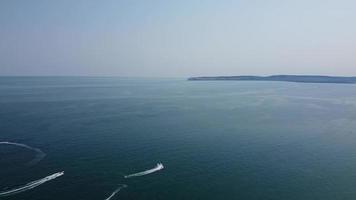 Aerial view Drone's footage of Fast, Racing and Sports Boats in the Ocean of Bournemouth Beach of England Great Britain video