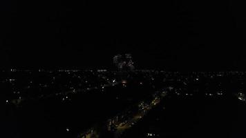 Live Fireworks over Luton Town of England on a Weeding Night. Drone's Night Flight over Luton Town of England. it was Asian wedding when they were enjoying the party and live fireworks, video