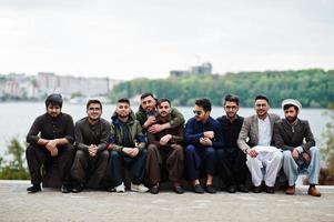 Group of pakistani man wearing traditional clothes salwar kameez or kurta. photo