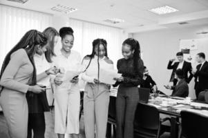 Diverse business people on a meeting at round table. photo