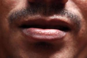 a lips closeup of man photo