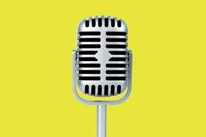 Microphone retro on yellow background photo