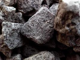 Macro image of crushed stone. Background of gray patterned texture of crushed stone. photo