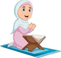niña de dibujos animados rezando y leyendo el sagrado corán vector