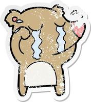 distressed sticker of a cartoon crying bear vector