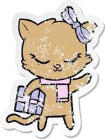 distressed sticker of a cute cartoon cat with present vector
