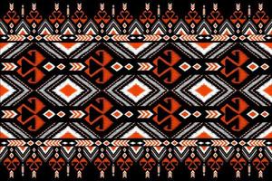 Beautiful embroidery.geometric ethnic oriental pattern traditional on black background.Aztec style,abstract,,illustration.design for texture,fabric,fashion women wearing,clothing,print. photo