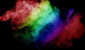 Abstract smoke isolated on black background,Rainbow powder photo