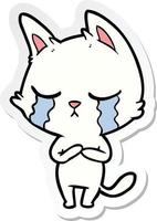sticker of a crying cartoon cat vector