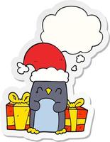 cute christmas penguin and thought bubble as a printed sticker vector