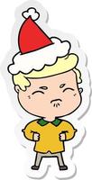 sticker cartoon of a annoyed man wearing santa hat vector