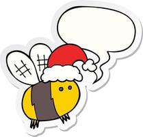 cute cartoon bee wearing christmas hat and speech bubble sticker vector