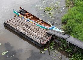 Traditional long tail boat in Thai style. photo
