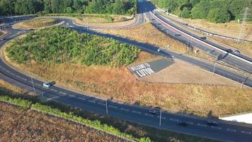 High Angle View of Luton Airport Junction Interchange of Motorways M1 J10 at Luton City of England UK. it is Connection Luton City and London Luton Airport Image Created on 11th August 2022 with Drone video