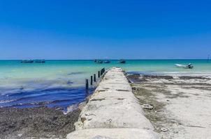 Beautiful Holbox island beach sandbank panorama turquoise water people Mexico. photo