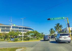 Cancun Quintana Roo Mexico 2022 Typical street road cars buildings and cityscape of Cancun Mexico. photo