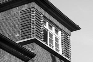 old brick wall with windows photo